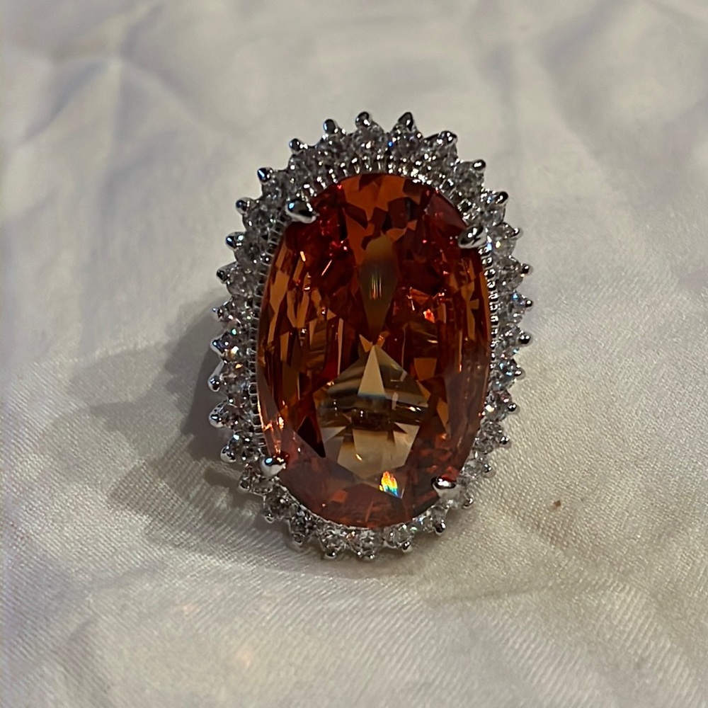 Women’s orange carat ring